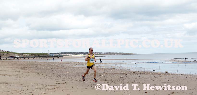 Andy Burn (Jarrow) finishing 2nd in the Pier to Pier Race, South Shields to Roker, Sunderland.